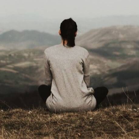 woman sitting in front of lookout