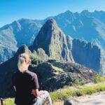 girl looking at Machu Picchu