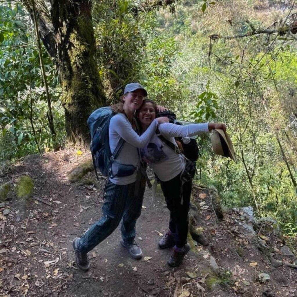 girls trekking in the forest