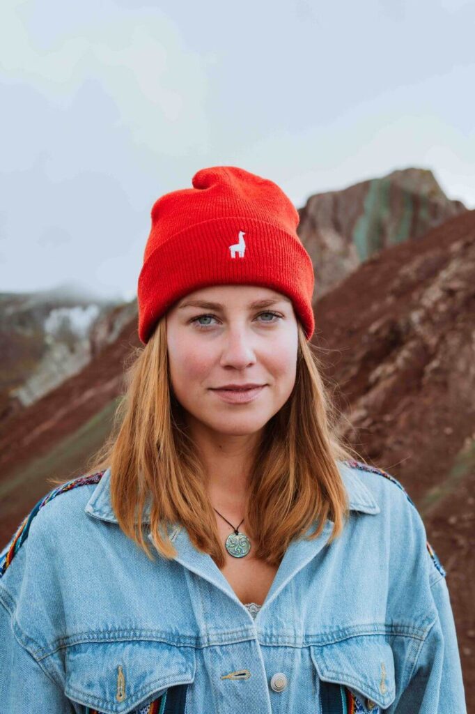 Laura Stasius from Nature Trips Peru with red beanie in the mountains